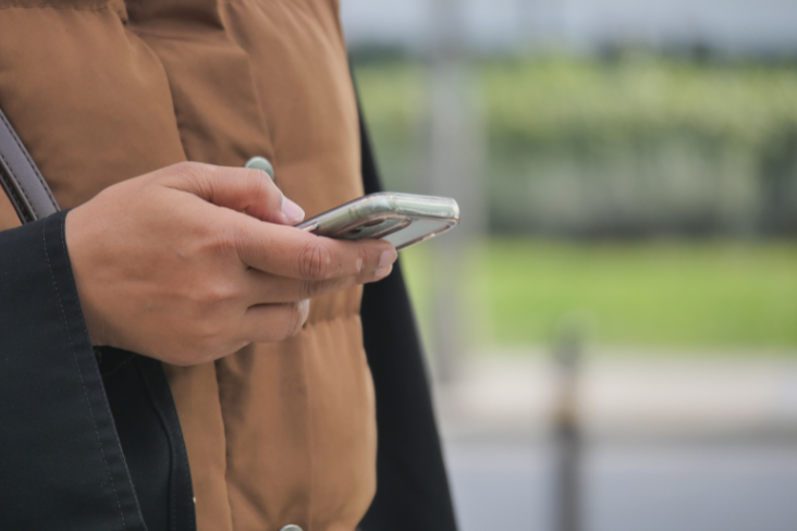 Person looking at mobile phone